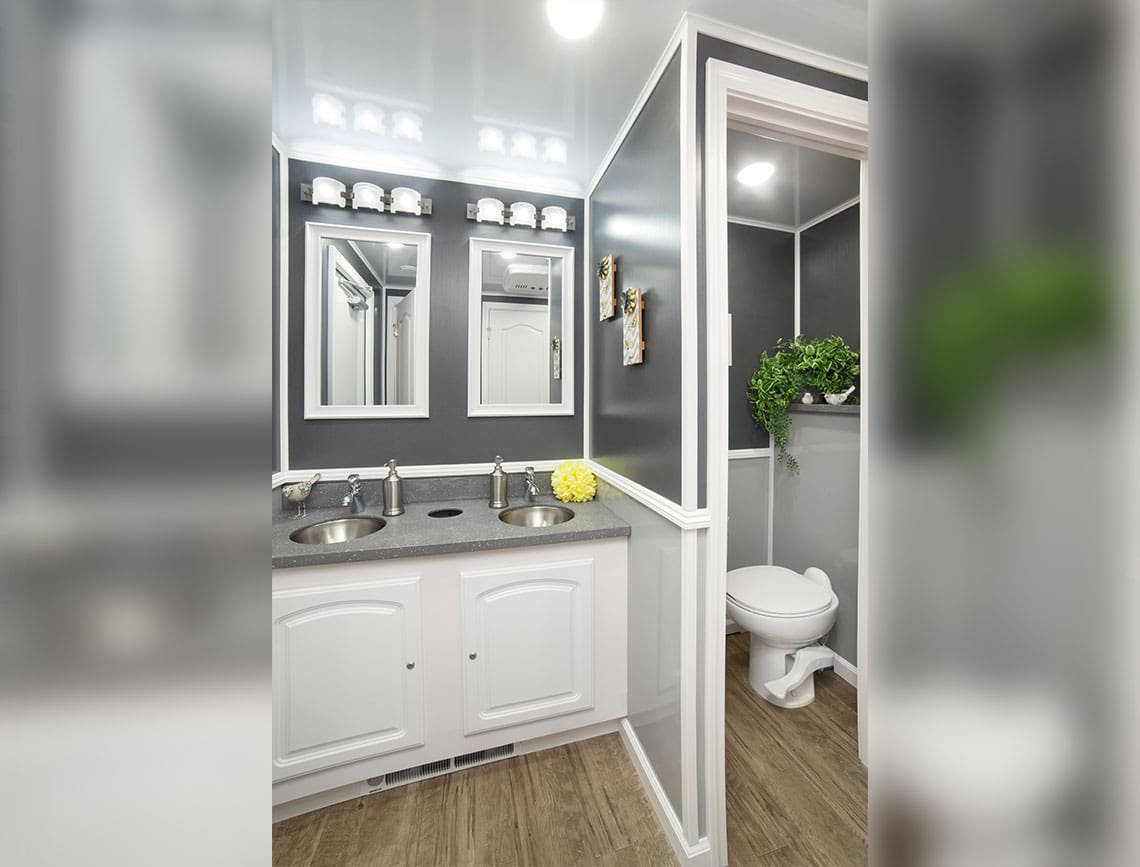 inside of women's 8 stall restroom trailer